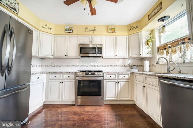 17 Drake St Unit 54A, Whiting, NJ 08759 - kitchen featuring stainless steel appliances, tasteful backsplash, ceiling fan, and light stone counters