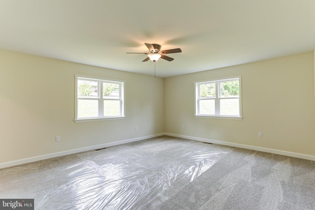 1406 Amosite Rd, Bainbridge, PA 17502 - empty room featuring healthy amount of natural light, ceiling fan, baseboards, and carpet