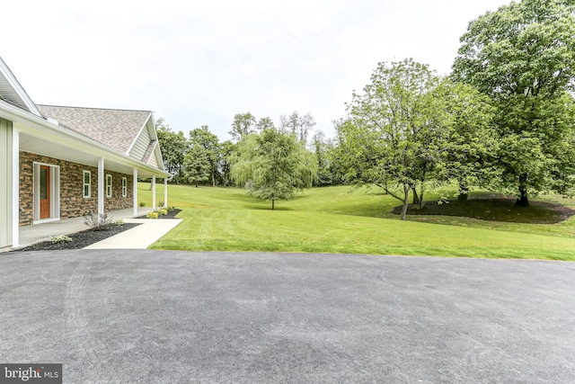 1406 Amosite Rd, Bainbridge, PA 17502 - view of grassy yard with a porch