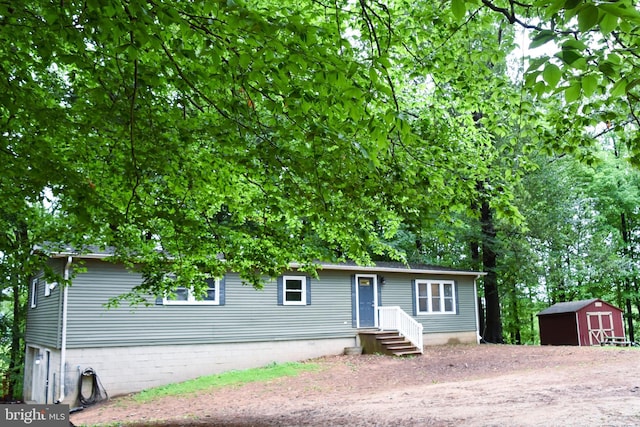 38 Behm Ln, Colora, MD 21917 - ranch-style home featuring a shed and an outbuilding