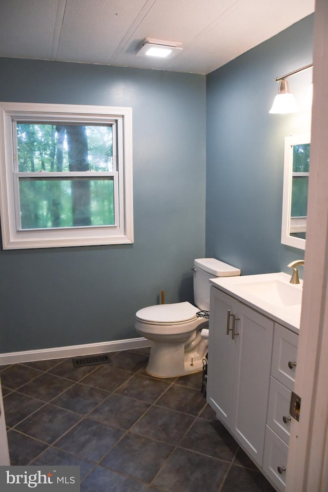 38 Behm Ln, Colora, MD 21917 - half bath featuring tile patterned flooring, toilet, vanity, and baseboards
