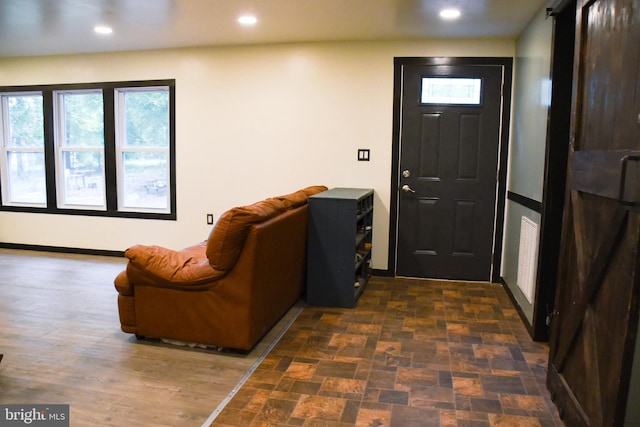 38 Behm Ln, Colora, MD 21917 - foyer with recessed lighting, a barn door, and baseboards