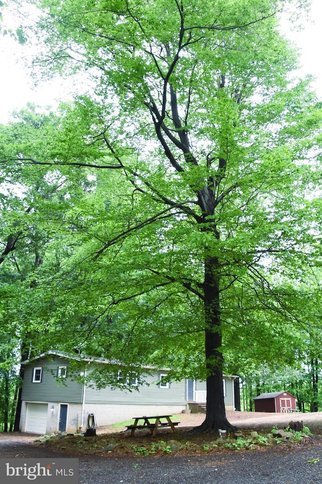 38 Behm Ln, Colora, MD 21917 - view of home's community with a garage and an outbuilding
