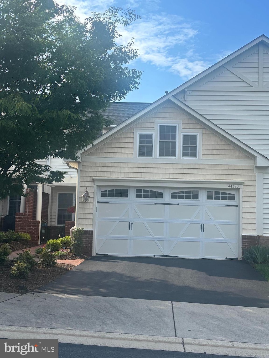 garage featuring driveway