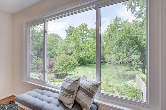 10518 Meadow Bridge Ln, Fairfax, VA 22030 - sitting room with plenty of natural light, wood finished floors, baseboards, and view of scattered trees