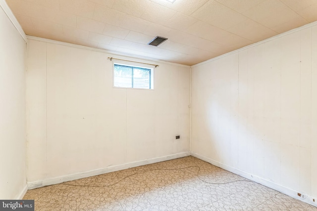 below grade area featuring baseboards