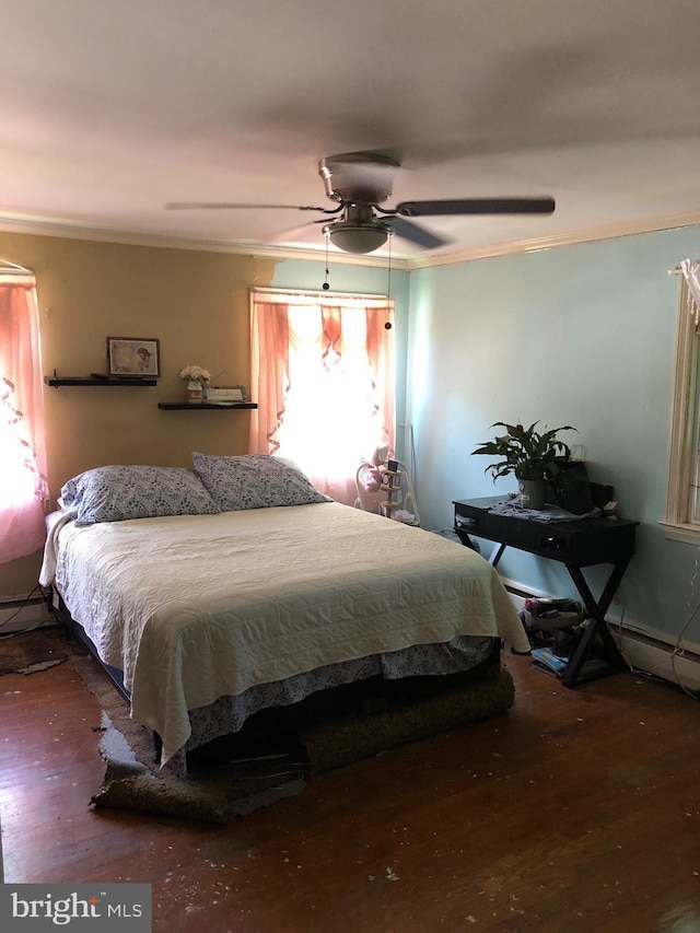 539 Pershing Ave, Darby, PA 19023 - bedroom featuring ornamental molding, wood finished floors, a ceiling fan, and baseboard heating