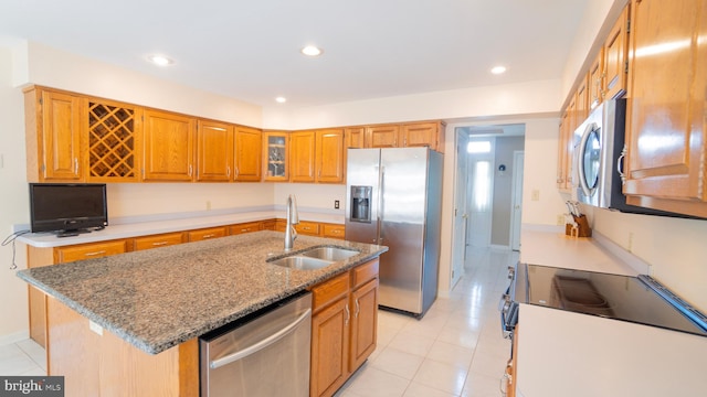 1042 Country Club Rd, Camp Hill, PA 17011 - kitchen with appliances with stainless steel finishes, stone countertops, light tile patterned floors, brown cabinets, and recessed lighting