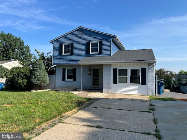 1122 Floribunda Ln, Mechanicsburg, PA 17055 - traditional-style home featuring brick siding and roof with shingles
