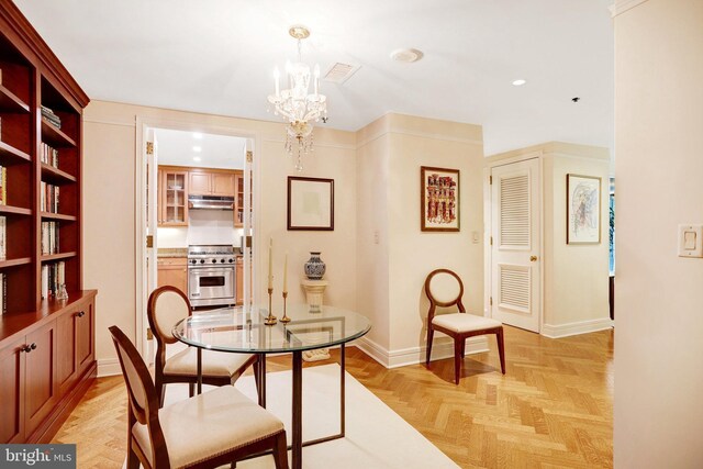 1155 23rd St NW Unit 2E, Washington, DC 20037 - dining room with a chandelier, baseboards, and recessed lighting