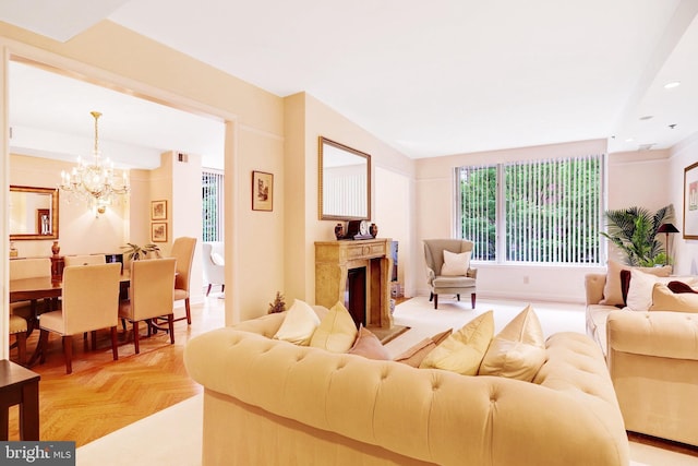 1155 23rd St NW Unit 2E, Washington, DC 20037 - living room with a chandelier and a premium fireplace