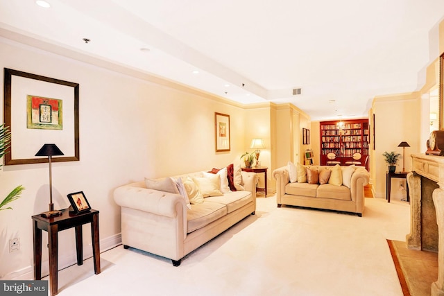 1155 23rd St NW Unit 2E, Washington, DC 20037 - living room featuring built in shelves, recessed lighting, light colored carpet, and baseboards