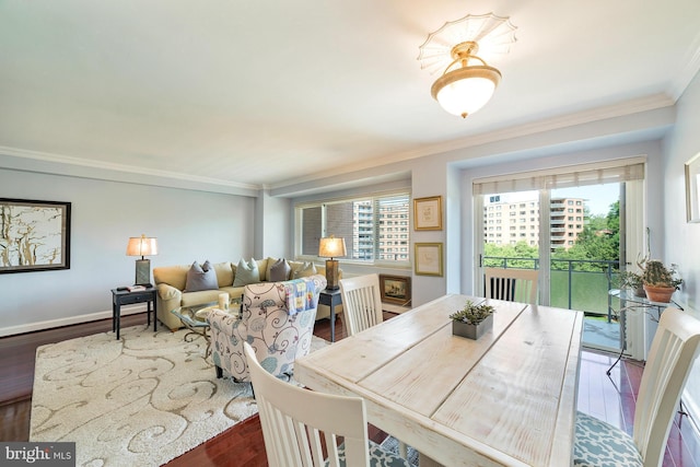 4201 Cathedral Ave NW Unit 916E, Washington, DC 20016 - dining room featuring crown molding and wood finished floors
