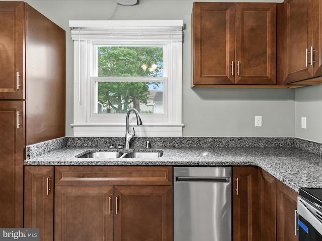 304 N Main St, Hebron, MD 21830 - kitchen with a sink, dark stone countertops, and range with electric stovetop