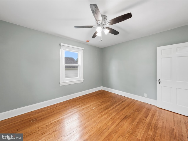 304 N Main St, Hebron, MD 21830 - empty room featuring baseboards, light wood finished floors, and a ceiling fan