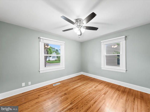 304 N Main St, Hebron, MD 21830 - spare room with baseboards, hardwood / wood-style flooring, and a ceiling fan