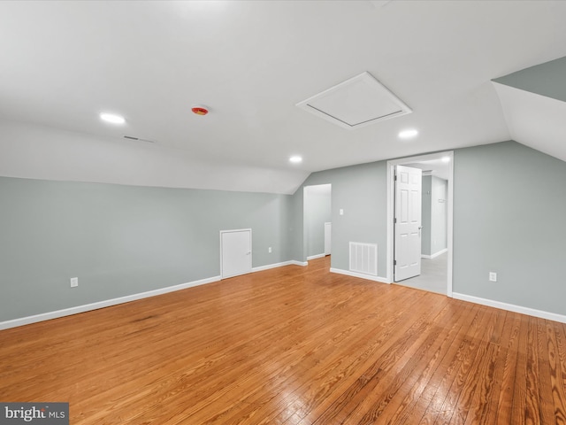 304 N Main St, Hebron, MD 21830 - additional living space featuring vaulted ceiling, light wood-style floors, baseboards, and recessed lighting