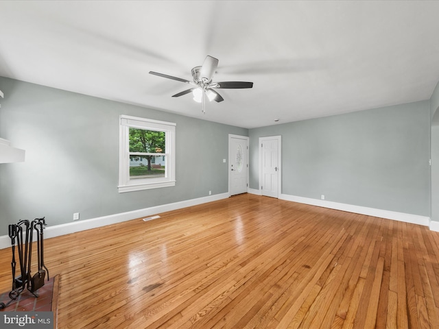304 N Main St, Hebron, MD 21830 - unfurnished room with ceiling fan, light wood-style floors, and baseboards
