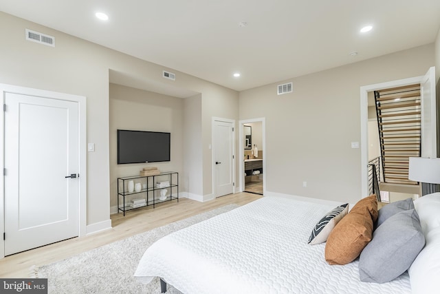 3231 Mercer St, Philadelphia, PA 19134 - bedroom with light wood-type flooring, baseboards, and recessed lighting