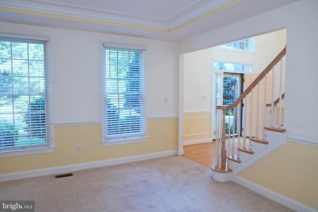 11504 Woodview Ct, Hagerstown, MD 21742 - carpeted empty room featuring crown molding and stairway