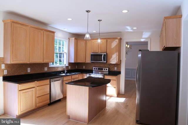 11504 Woodview Ct, Hagerstown, MD 21742 - kitchen with appliances with stainless steel finishes, light brown cabinets, a sink, light wood-type flooring, and recessed lighting