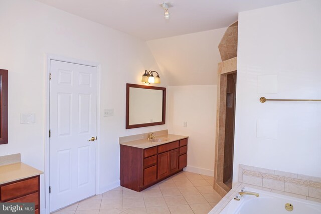 11504 Woodview Ct, Hagerstown, MD 21742 - full bathroom with vanity, tile patterned flooring, a tile shower, a garden tub, and lofted ceiling
