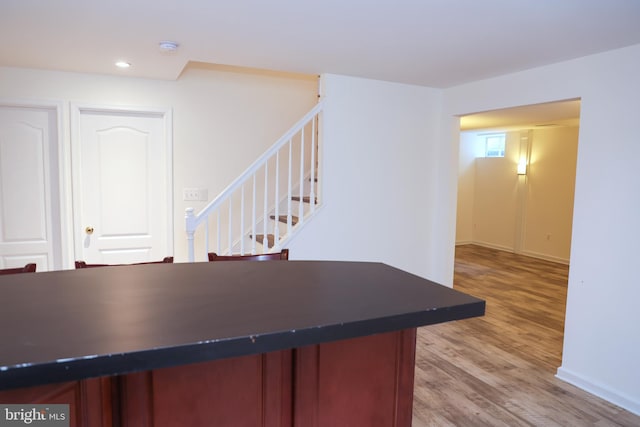 11504 Woodview Ct, Hagerstown, MD 21742 - dining space featuring wood finished floors, stairs, recessed lighting, and baseboards