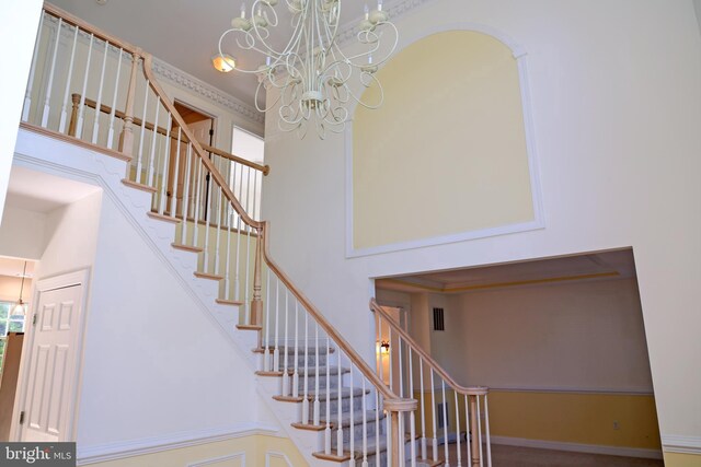 11504 Woodview Ct, Hagerstown, MD 21742 - staircase featuring a chandelier