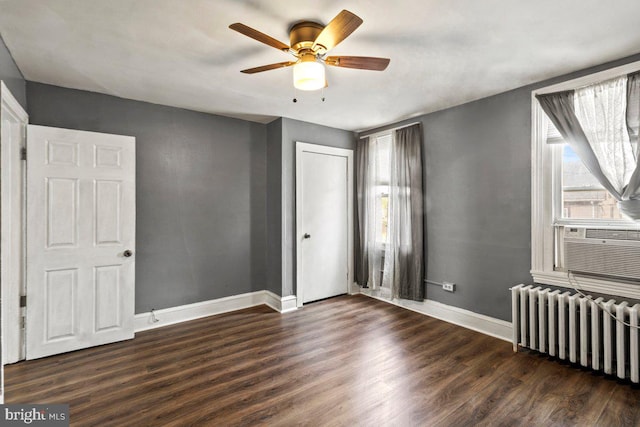 636 Elizabeth St, Beverly, NJ 08010 - unfurnished bedroom with radiator heating unit, wood finished floors, baseboards, cooling unit, and a ceiling fan