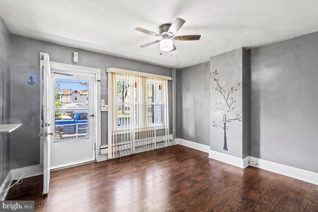 636 Elizabeth St, Beverly, NJ 08010 - empty room with wood finished floors, ceiling fan, and baseboards