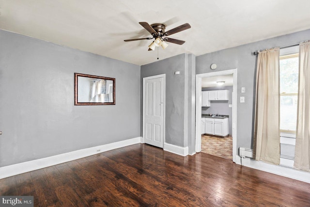 636 Elizabeth St, Beverly, NJ 08010 - unfurnished bedroom featuring dark wood finished floors, baseboards, and a closet