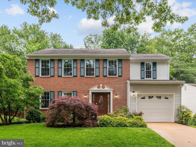 275 Tolstoy Ln, Severna Park, MD 21146 - view of front of house with a garage, a front lawn, and driveway