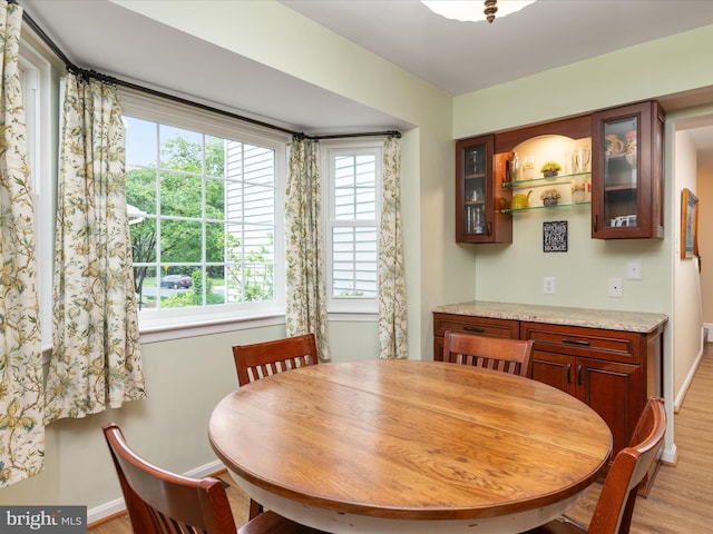 275 Tolstoy Ln, Severna Park, MD 21146 - dining area with light wood-style floors and baseboards