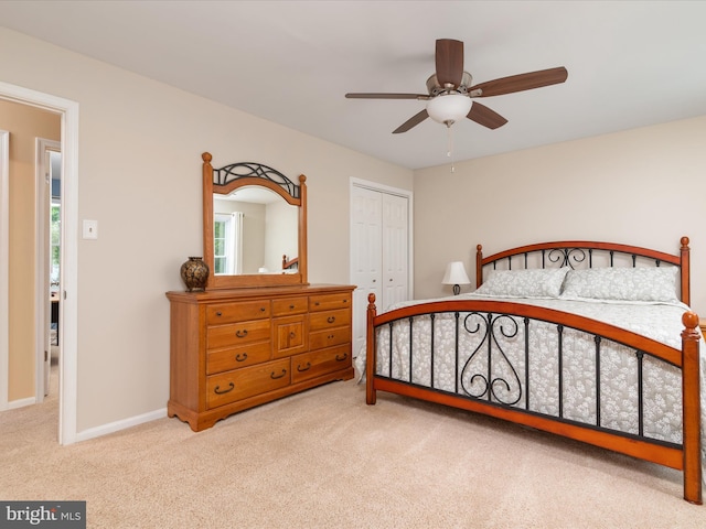 275 Tolstoy Ln, Severna Park, MD 21146 - carpeted bedroom with a closet, baseboards, a ceiling fan, and multiple windows
