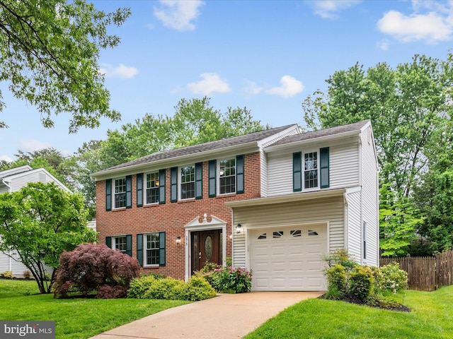 275 Tolstoy Ln, Severna Park, MD 21146 - view of front facade featuring an attached garage, driveway, and brick siding
