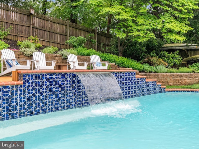 275 Tolstoy Ln, Severna Park, MD 21146 - view of swimming pool with fence and view of wooded area