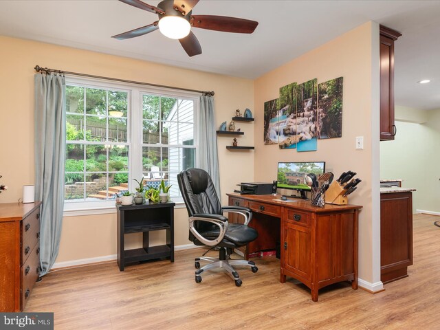275 Tolstoy Ln, Severna Park, MD 21146 - office with light wood-style flooring, a ceiling fan, plenty of natural light, and baseboards
