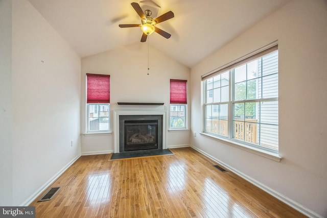504 Nottingham Pl, Riverside, NJ 08075 - unfurnished living room featuring hardwood / wood-style flooring, a fireplace with flush hearth, a ceiling fan, baseboards, and vaulted ceiling