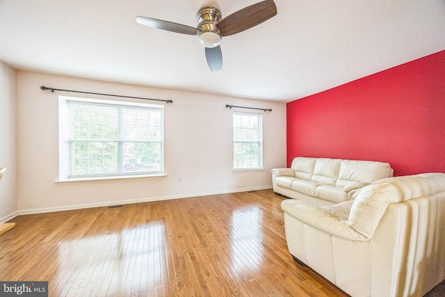 504 Nottingham Pl, Riverside, NJ 08075 - living area featuring wood finished floors, baseboards, ceiling fan, and an accent wall