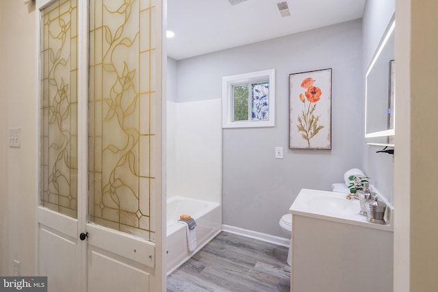 136 Pembrown Rd, Browns Mills, NJ 08015 - full bath with wood finished floors, vanity, toilet, and baseboards