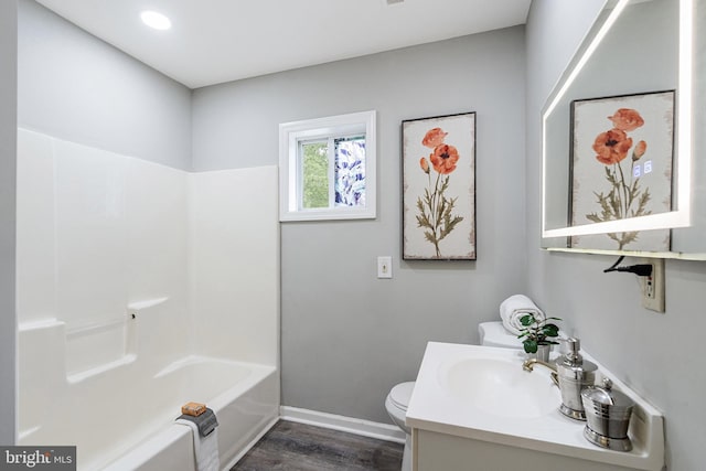 136 Pembrown Rd, Browns Mills, NJ 08015 - full bathroom featuring wood finished floors, toilet, vanity, baseboards, and bathing tub / shower combination