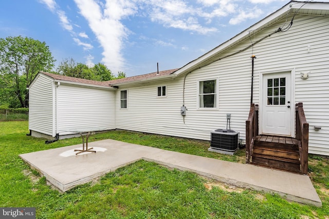 136 Pembrown Rd, Browns Mills, NJ 08015 - back of property featuring a lawn, central air condition unit, and a patio