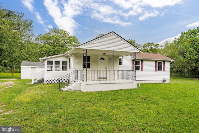 136 Pembrown Rd, Browns Mills, NJ 08015 - bungalow-style home with covered porch and a front lawn