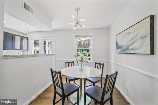 2034 Fort Davis St SE Unit B, Washington, DC 20020 - dining space featuring dark wood-style flooring and a chandelier