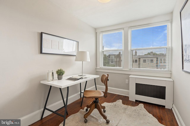 office area featuring baseboards and wood finished floors