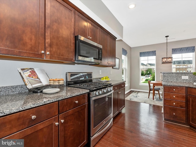 5920 Forum Sq ., Unit Frederick, MD 21703 - kitchen with stainless steel appliances, dark wood-type flooring, stone countertops, pendant lighting, and a chandelier