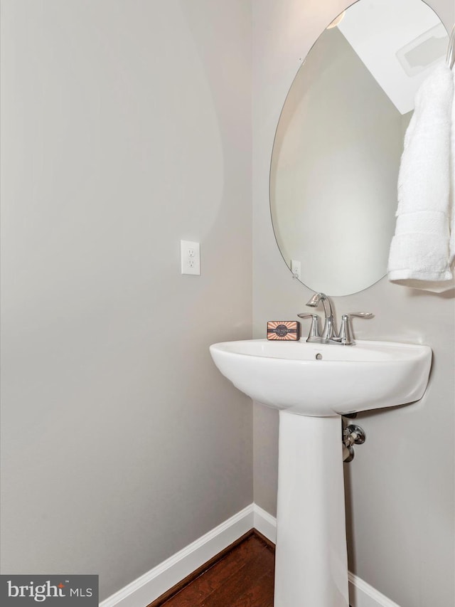 5920 Forum Sq ., Unit Frederick, MD 21703 - bathroom featuring baseboards and wood finished floors