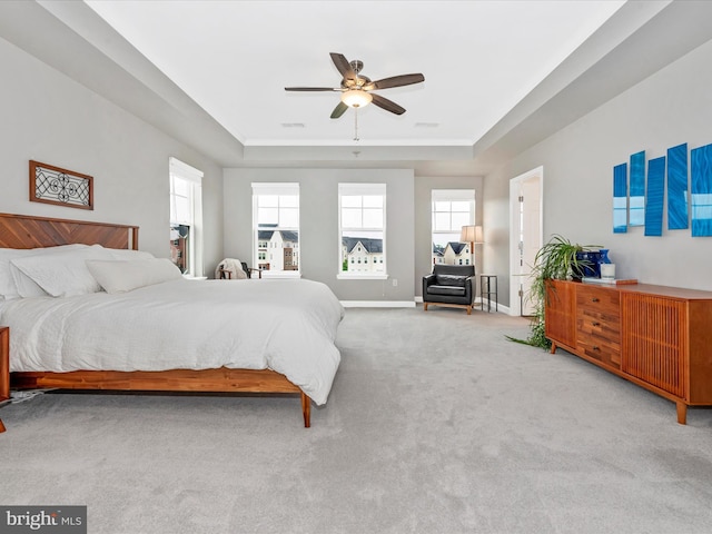5920 Forum Sq ., Unit Frederick, MD 21703 - bedroom featuring a raised ceiling, carpet flooring, baseboards, and ceiling fan