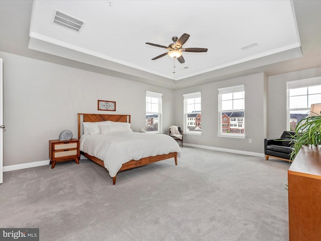 5920 Forum Sq ., Unit Frederick, MD 21703 - bedroom featuring a raised ceiling, multiple windows, light colored carpet, and crown molding
