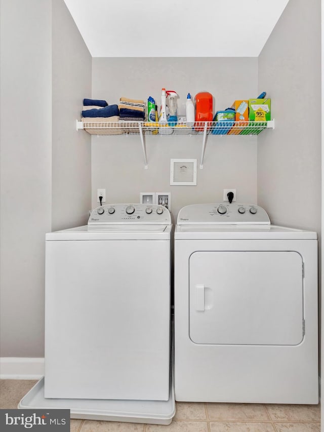 5920 Forum Sq ., Unit Frederick, MD 21703 - clothes washing area with washing machine and clothes dryer